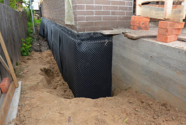 Happy homeowners after waterproofing job in Turners Station